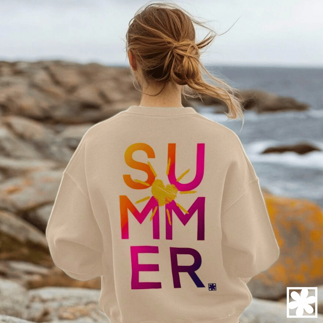 A woman faces away from the camera and the back of her sweatshirt says Summer in bright colours